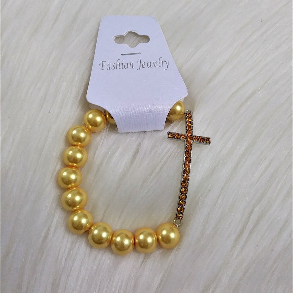 💥3/$12 Yellow pearl and rhinestone cross bracelet